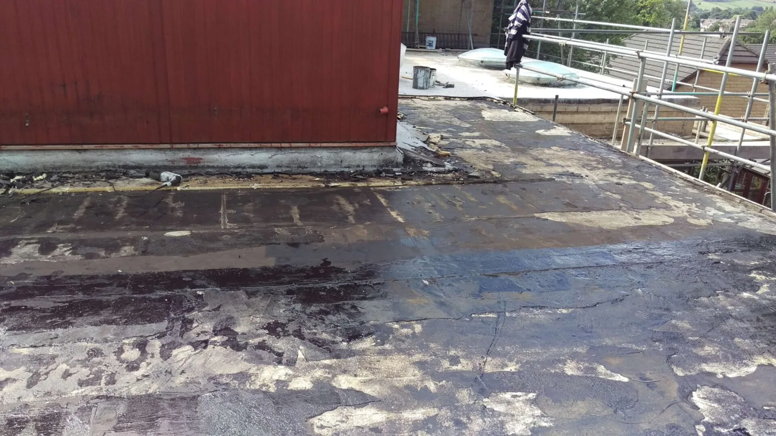 Storm damaged flat roof on a commercial building Storm damaged flat roof on a commercial building